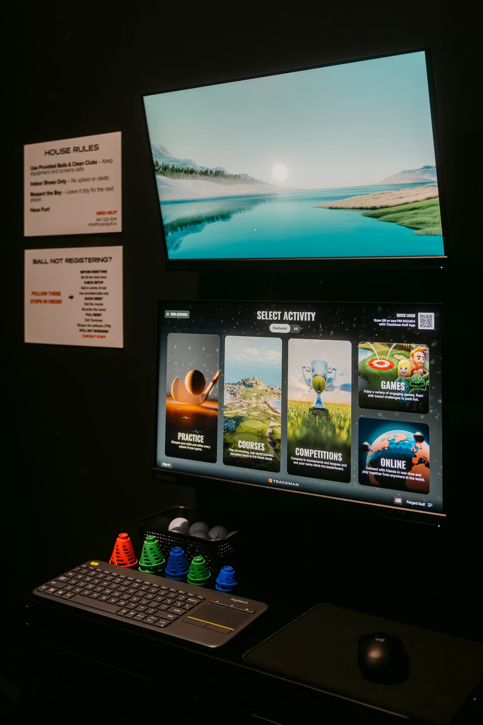 Fully set up indoor golf simulator bay ready for play at Forged Golf